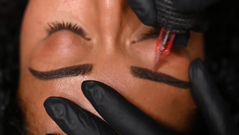 Microblading,-permanent-makeup-or-tattooing-of-eyebrows-by-professional