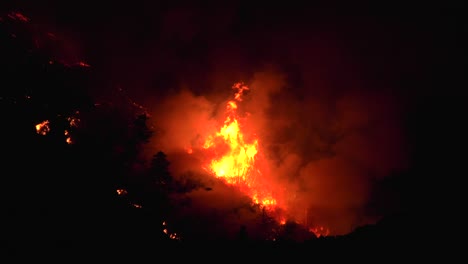 Wildfire-roars-through-dark-canyon---Night-View