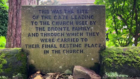 Video-of-a-stone-plaque-telling-of-the-old-gateway-leading-from-the-Bronte-Parsonage-to-St-Michael-and-All-Angels-Church-Graveyard