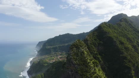 Drone-clip-of-the-peak-of-a-mountain-in-Madeira-with-the-vast-and-epic-landscape-in-the-background