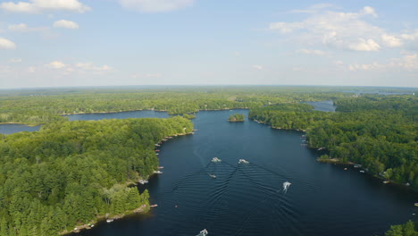 Aerial-view-of-Muskoka-river-on-a-beautiful,-sunny-summer-day