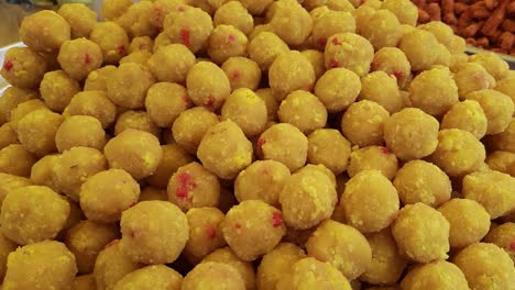 Indian-sweet-motichoor-laddoo-or-Bundi-laddu-is-made-of-gram-flour-very-small-balls-or-boondis-which-are-deeply-fried-and-soaked-in-sugar-syrup-before-making-balls
