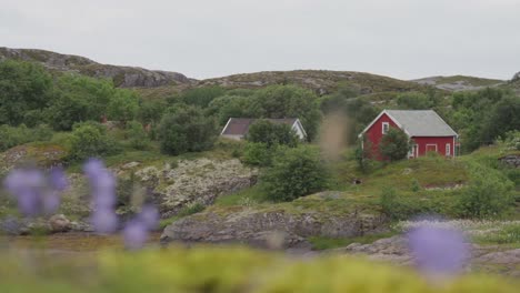 Picturesque-Landscape-Of-Norwegian-Cabin-Houses-On-The-Mountain-Hill-At-Daylight
