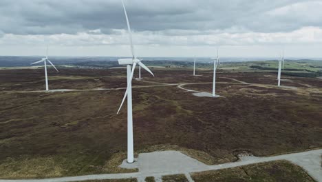Drone-aerial-view-of-a-wind-farm-and-wind-turbines-turning-in-the-wind-4