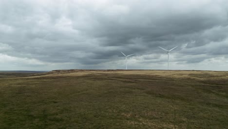 Drone-aerial-view-of-a-wind-farm-and-wind-turbines-turning-in-the-wind-3