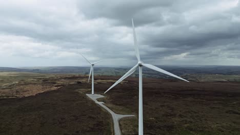 Drone-aerial-view-of-a-wind-farm-and-wind-turbines-turning-in-the-wind-2