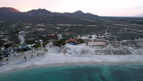 Orbital-drone-shot-of-the-beach-of-Ensenada-de-los-Muertos-in-Mexico