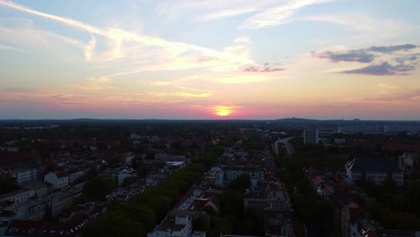 Long-flight-towards-the-sun
Tranquil-aerial-view-flight-fly-forward-drone
of-Berlin-steglitz-germany-at-summer-sunset-August-2022