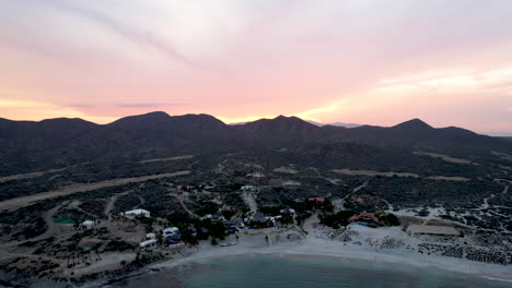 Drone-shot-with-elevation-at-sunset-on-the-beaches-of-Baja-California-Sur-Mexico