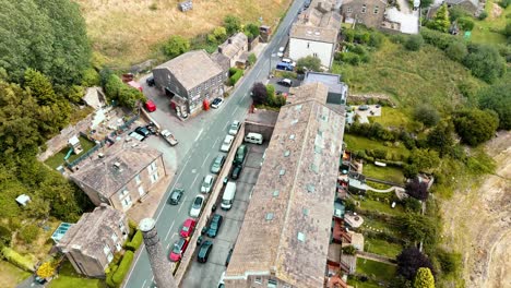 Aerial-drone-footage-of-a-rural-Yorkshire-Village-with-a-mill-chimney