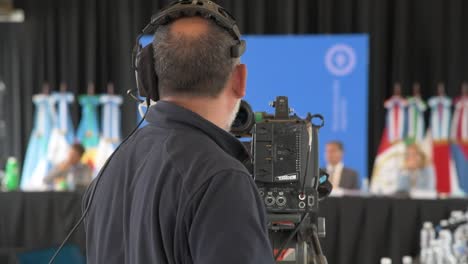 A-view-from-the-back-of-a-cameraman-in-a-political-debates