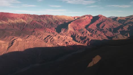 Panoramic-Aerial-View-Of-Hornocal-Mountains-Shape-With-Dark-Shadow,-North-Argentina