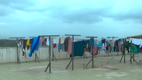 Clothes-Hanging-Outside-On-A-Roof-Top-To-Dry
