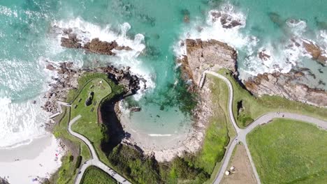 Drone-aerial-top-view-of-a-honeymoon-beach-in-Galicia,-Spain