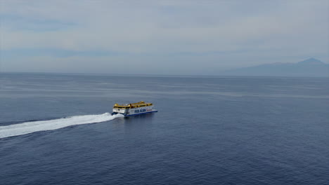 Side-tracking-aerial-shot-of-the-Fred-Olsen-company-ship-whose-destination-is-the-island-of-Tenerife