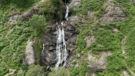Drone-aerial-footage-of-the-Taylor-Gill-Force-Waterfall-at-Borrowdale,-Seathwaite-and-is-one-of-the-highest-waterfalls,-in-the-Lake-District-National-Park