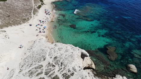 Drone-reveals-Saint-Antoine-beach-in-Corsica-with-a-slow-down-up-movement-of-the-camera