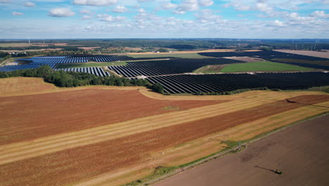Panoramic-View-Over-Solar-Energy-Farm-Producing-Clean