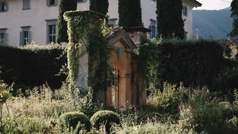 Ancient-stone-gate-in-famous-Villa-Balbiano-garden
