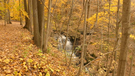 A-waterfall-in-autumn-in-the-middle-of
