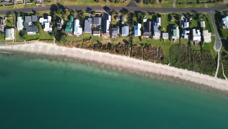 Cinematic-aerial-shot-along-Cooks-beach-in-New