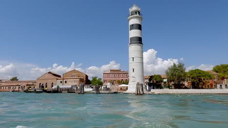Passing-the-beautiful-Murano-Lighthouse-on-a-boat
