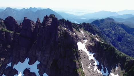 Aerial-Pan-Left-Jagged-Mountain-Range---Mackenzie-Range,-Vancouver-Island,-BC,-Canada