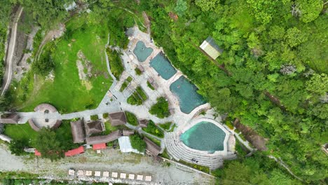 Aerial-fly-drone-view-of-hot-spring-Cocalmayo,-Santa-Teresa,-Peru,-Andes,-South-America-1