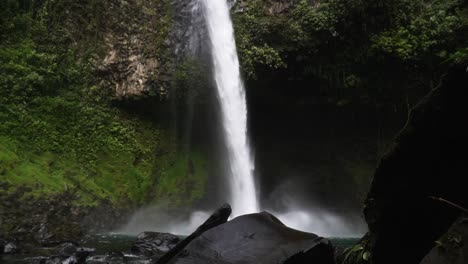 Reveal-shot-of-la-fortuna-waterfall-in-costa-rica-in-the-rain-forest-of-central-america