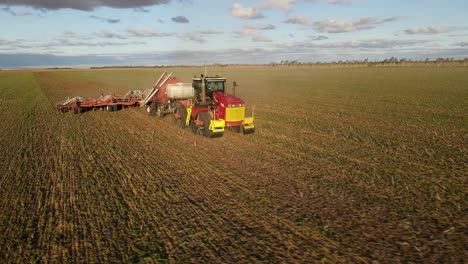 New-Seeding-equipment-towed-by-a-tractor-across-a-healthy-paddock