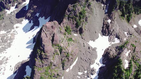 Aerial-Pull-Back-Jagged-Mountain-Range---Mackenzie-Range,-Vancouver-Island,-BC,-Canada