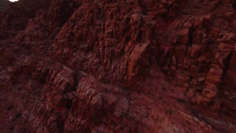 FPV-drone-shot-of-rocky-red-mars-like-planet-landscape