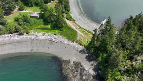 Aerial-view-of-tourists-exploring-at-Rosario-Beach-in-Washington-State