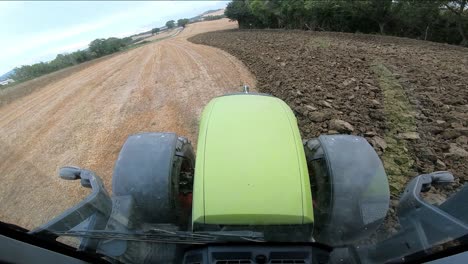 Tractor-fuel-tank-pov-commuting-at-rough-soil-of-Ancona-Italy