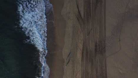 Aerial-shot-over-maspalomas-beach-and-where-the-waves-break