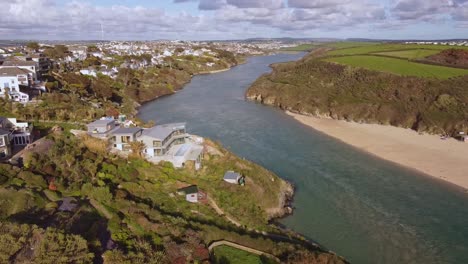 Aerial-shot-steel-frame-construction-overlooking-seaside-in-Cornwall-3