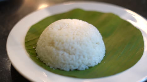 Bowel-of-rice-plating-on-banana-leaf-eggs-and-curry-dish-South-Indian-food-3