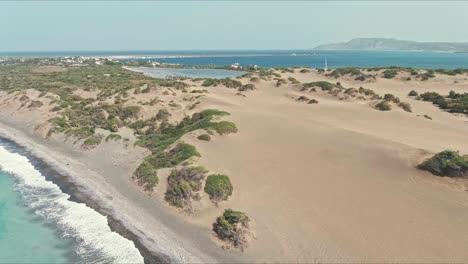 Aerial-view-around-sandbanks-at-the-Dunes-of-Bani,-sunny-Dominican-Republic---orbit,-drone-shot