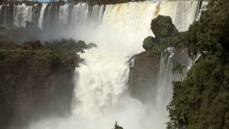 Massive-flow-of-water-cascading-at-Iguazu-Falls,-in-Iguazu-National-Park,-Brazil-Argentina-border