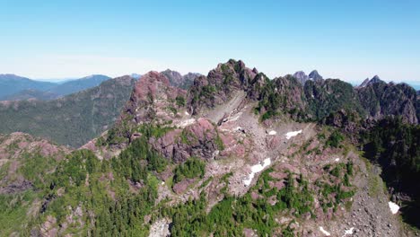 Aerial-Fly-Back-Pull-Up-of-Jagged-Mountain-Peaks---Mackenzie-Range,-Vancouver-Island,-BC,-Canada