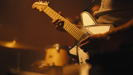 Close-up-of-fingers-playing-electric-guitar-4