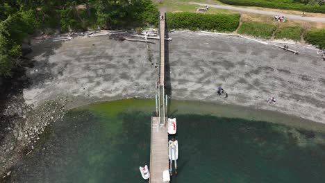 Drone-shot-of-a-public-down-out-in-a-shallow-bay-on-Whidbey-Island