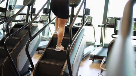 Girl-doing-stairs-workout-at-the-gym