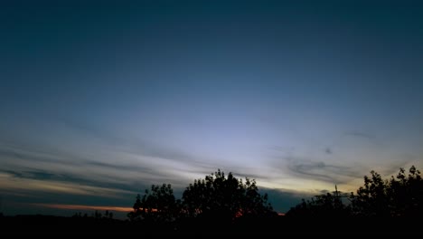 Time-lapse-moving-left-to-right-at-blue-hour-nightfall-silhouette-Netherlands