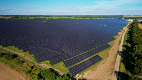 Aerial-View-Of-Large-Scale-Solar-Farm-On-Clear-Sunny-Day
