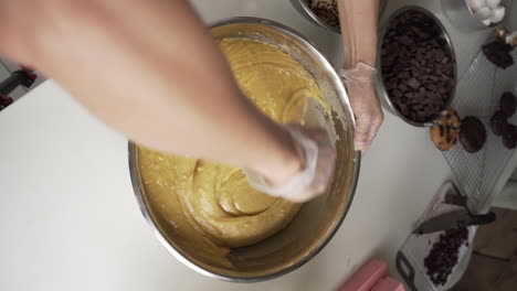 Overhead-Shot-Of-Cookie-Dough-Mixing-In-The-Kitchen-Using-Baking-Spatula