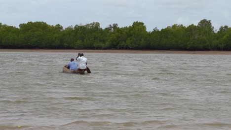 A-canoe-boat-crossing-a-Lake