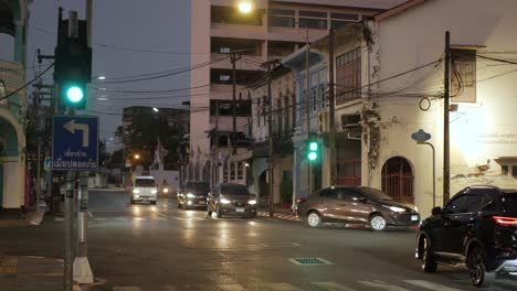 Pov-to-the-stoplight-traffic-safety-sign-light-in-sunset-time-in-phuket-old-town-thailand