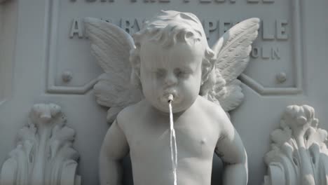Creepy-Cherub-Water-Fountain-Spits-Water-From-Baby's-Mouth