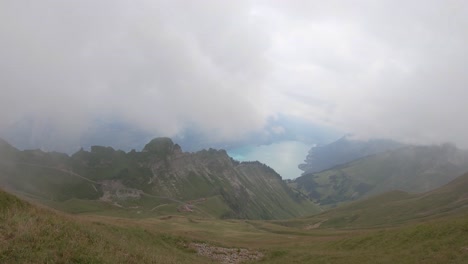Amazing-panorama-of-alpine-meadow-and-Brienz-lake,-Switzerland-on-cloudy-day